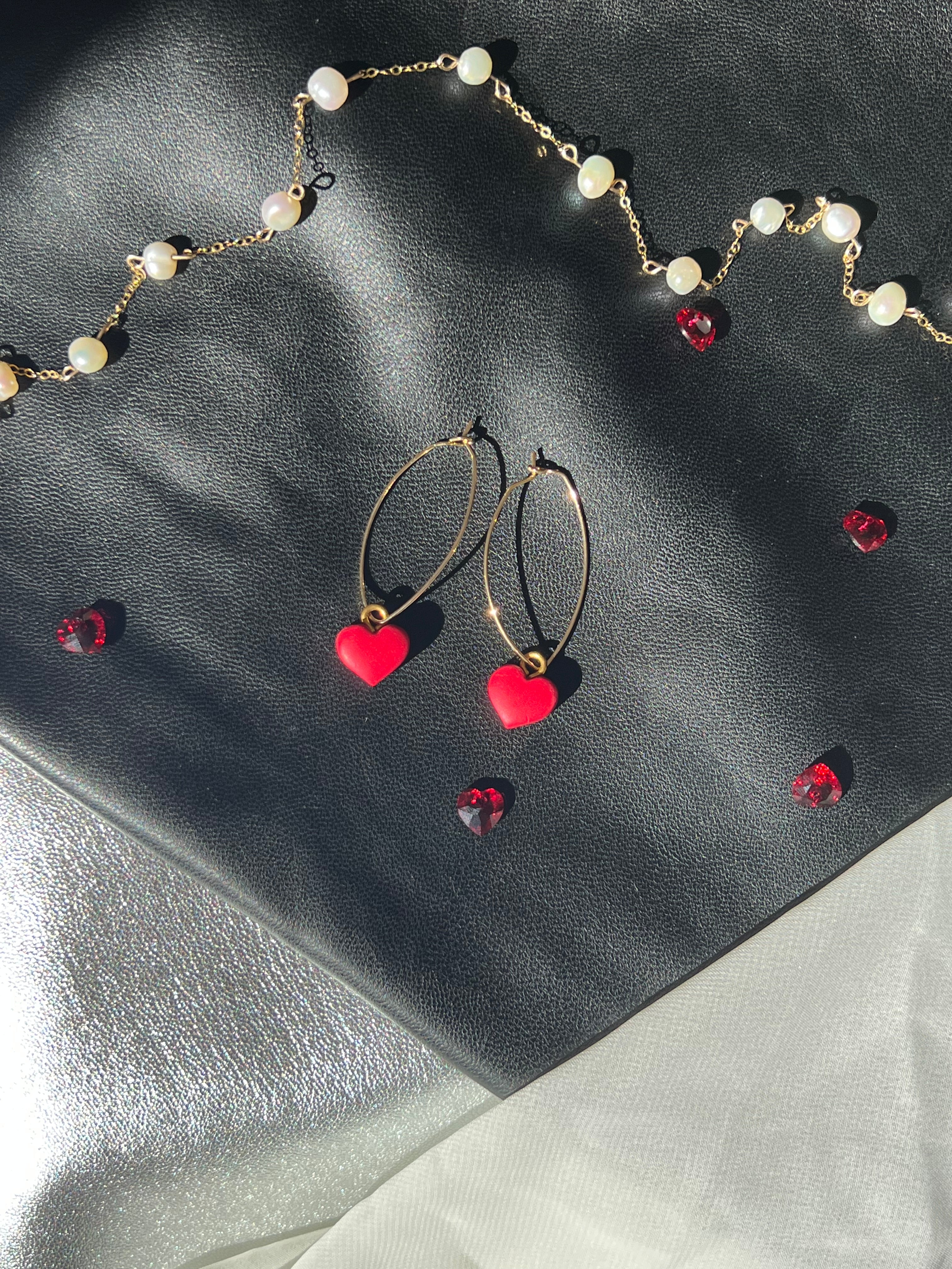 Heart shaped clay beads (red + black)