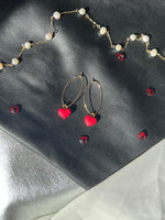 Load image into Gallery viewer, Heart shaped clay beads (red + black)
